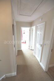 Upstairs landing with access to all bedrooms and to attic for storage 